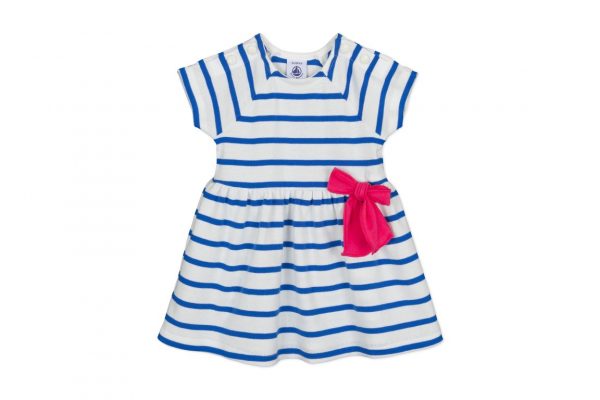 A sweet girls dress with fuchsia bow by Petit Bateau