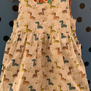 Reversible Pinafore Dress - Apple and Dinosaur by Ruth Lednik